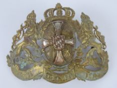 A WWI German Pickelhaulbe helmet plate.