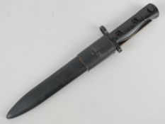 A LIA3 bayonet having black painted handle, black metal associated scabbard and leatherette frog.