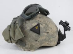 A USA helmet with goggles and night vision mount.