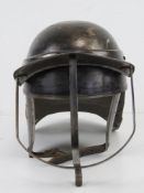 A reenactor or display piece English Civil War style 'Lobster Tail' helmet.