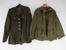 An Italian OD Long Field Jacket, size 46 together with a Dutch officers dress jacket, dated 1987.