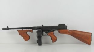 A reproduction WWII British Thompson sub machine gun by Denix, Spain,