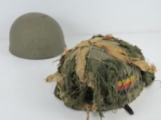 A WWII despatch riders helmet,