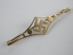 A 9ct gold swastika brooch 4.5cm in length, 1.6g.