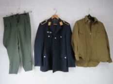 A post war Luftwaffe jacket size 42 together with a German WWII SS officers belt with strap.