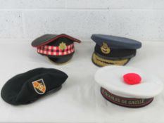 A Scots Guards cap named to 'Ramsay' (size 56), a US Special Forces Vietnam beret, an RAF No.