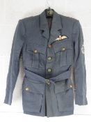A WWII RAF Pilot Officer's No1 dress jacket having brass buttons and cloth badge upon,