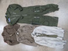 A RAF coveralls size 4. 1 x khaki tie. 1 x shirt size 59. 1x Mens combat shirt, size 59.