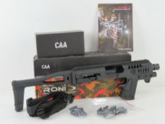 A Micro Roni Conversion System for the Glock 19 and Glock 23. CAA manufacture. New in box.