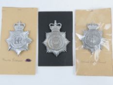 Three British Police helmet badges; Nottingham, Stoke City and South Yorkshire.