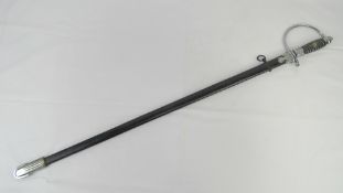 A reproduction WWII German Waffen SS Guards sword and scabbard.