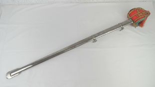A Scottish style basket hilt sword with scabbard.