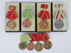 Four boxed Russian medals, one Russian medal grouping.