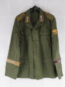 A re-enactor's WWII German Afrika Corps Field Jacket (size 58).