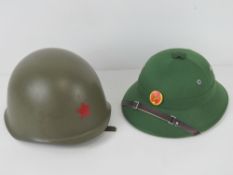 Two reproduction WWII Russian hats being a Red Star Pith helmet (size 58) and a Russian Red Star