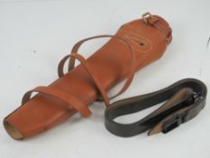A reproduction WWI G98 leather breach cover and sling.