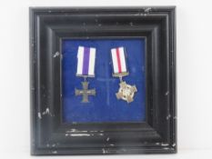 A Conspicuous Gallantry Cross medal together with an Elizabeth II Cross medal, framed and mounted.