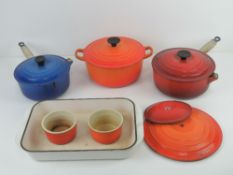 Le Cruset Cookware; casserole dish (20), two lidded saucepans, oven dish and two ramekins.