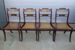 A set of four late 19thC rosewood dining chairs each with Berger seat support and having inlaid