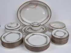 A large quantity of rare Art Deco style George Jones china dinnerware the 'Alhambra' pattern being
