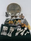 A quantity of silver plated flatware together with a large silver plated serving tray,