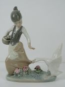 Lladro figurine 1288 'Aggressive Goose' a girl carrying basket of eggs with goose pecking at skirt,
