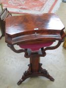 A good half veneered walnut work table having flame mahogany top,