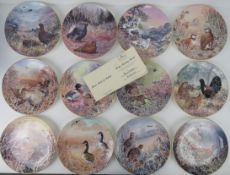 A set of twelve 'Game Birds of Britain' Wedgwood Compton and Woodhouse decorative plates,