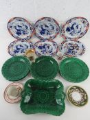 A set of five Spode New Stone Oriental influence plate together with a quantity of green Wedgwood