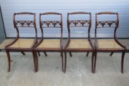 A fine set of four rosewood 19thC dining chairs each with Berger seat supports and having ornate