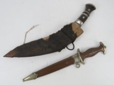 A reproduction WWII German SA Dagger together with a Gurka Kukri Dagger.