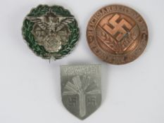 Three WWII German day badges.