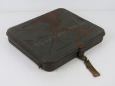 A WWII German Gas Cape tin, one hinge broken.