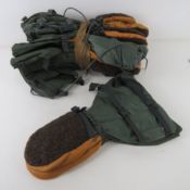 Five pairs of US army gloves.