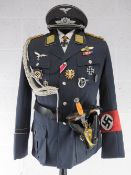 A museum quality reproduction Geschwader Richtofen Luftwaffe dress jacket with insignia, belt,