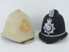 Two reproduction British helmets being a Ministry of Defence Police helmet made by Compton Webb