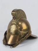 A reenactor or display piece Victorian style brass 'Merryweather' helmet.