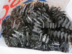 Twenty-five MG53 ammunition belt links.