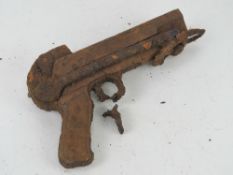 An MP40 bottom receiver in relic condition, with stock, pistol grip and trigger.