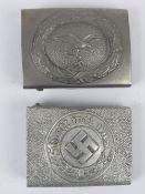 Two reproduction WWII German belt buckles.