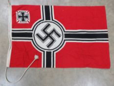 A reproduction WWII German flag 35 x 21 ½ inches.