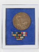 A WWI Death Penny for William Day having medal ribbons below, within contemporary frame.