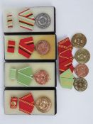 Four boxed Russian medals, one Russian medal grouping.