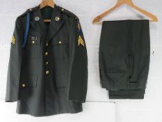 A USA Uniform with insignia, Jacket size 37S, Trousers no size visible.
