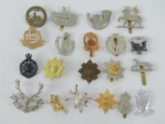A quantity of assorted British regiment cap/helmet badges, approx 20 items, inc Royal Irish Rangers,