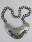 A reproduction WWII German Feldgendarmerie Gorget.