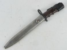 A Sterling SMG bayonet and scabbard.