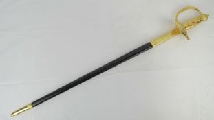 A reproduction WWII German dress sword with scabbard.