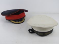 A Household Cavalry ceremonial cap, together with an Ark Royal Sailors Hat.