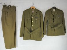 Two dress jackets sized 38, and 14, a pair of dress trousers size 45, officers caps, sailors cap,